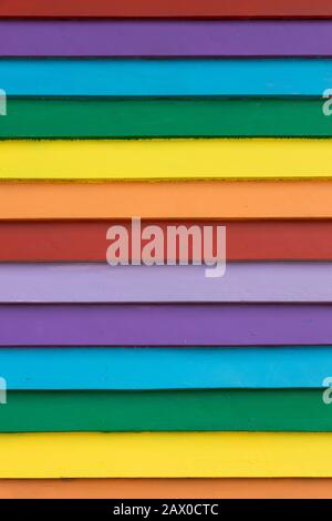 multi colored rainbow painted wooden weather boards close up, colorful texture background Stock Photo