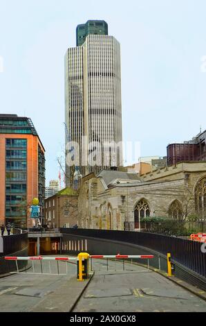 LONDON, UNITED KINGDOM - JANUARY 17: B42 tower, skyscraper, old church and other buildings on Tower Hill district, on January 17, 2016 in London, Engl Stock Photo