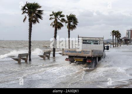 Southend on Sea, Essex, UK. 10th Feb, 2020. The tail end of storm Ciara combined with a high tide has breached the sea defences along the town's Western Esplanade causing a road closure after some traffic braved the water. A truck driving through deep saltwater Stock Photo