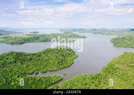 Hills with rainforest and sea lakes, top view. The nature of the Philippines, Samar. Tropical landscape. Summer and travel vacation concept. Stock Photo