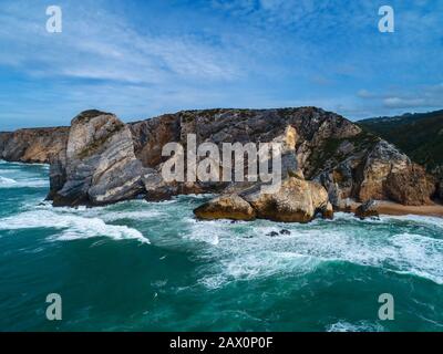 Atlantic coast with rock cliffs and waves Stock Photo