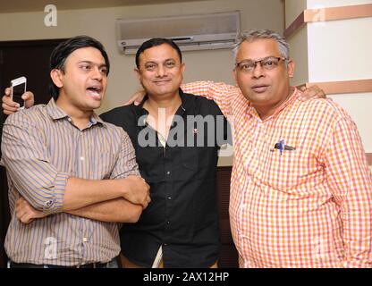 Mumbai, Maharashtra, India- Asia, March. 04, 2016 - Portrait Indian three young men family friends smiling Stock Photo