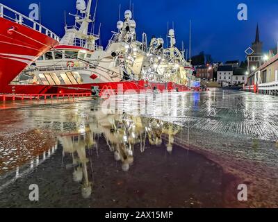 KILLYBEGS, DONEGAL / IRELAND - FEBRUARY 09 2020 - The harbour is full of fishing boats during storm Ciara. Stock Photo