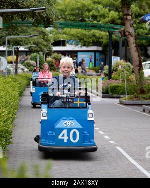 Billund, Denmark 2012 Children taking driver's license with Lego cars at Legoland, Billund. Photo Jeppe Gustafsson Stock Photo