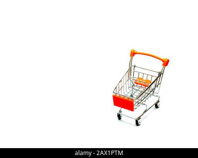 Mini shopping cart isolated on white background. Stock Photo