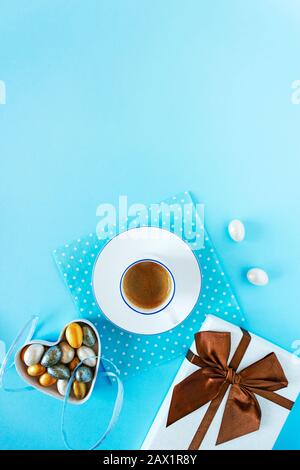Romantic breakfast with a cup of freshly brewed coffee, sweets and gift. Easy healthy sweet holiday snack. The concept of Valentine's day. Food photos Stock Photo
