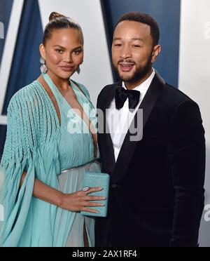 Beverly Hills, United States. 10th Feb, 2020. Chrissy Teigen (L) and John Legend arrive for the Vanity Fair Oscar party at the Wallis Annenberg Center for the Performing Arts in Beverly Hills, California on February 9, 2020. Photo by Chris Chew/UPI Credit: UPI/Alamy Live News Stock Photo