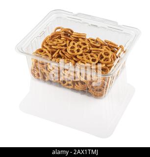 crackers in a transparent plastic container on a white background isolated with clipping path Stock Photo