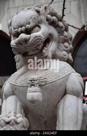 Chinese stone dragon, Chinatown, Gerrard Street, Soho, London Stock Photo