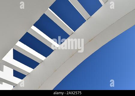 White pergola 4 against bright blue Canarian sky Stock Photo