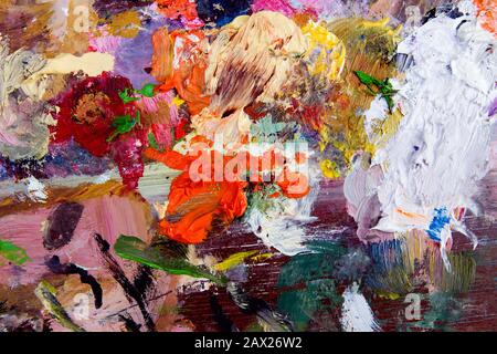 Detail of colorful painter color palette, grungy background or texture Stock Photo