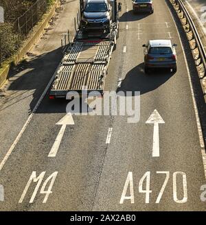 TAFFS WELL, NEAR CARDIFF, WALES - JUNE 2018: Aerial view of traffic and lane markings on the A470 trunk road at Taffs Well heading towards Cardiff. Stock Photo