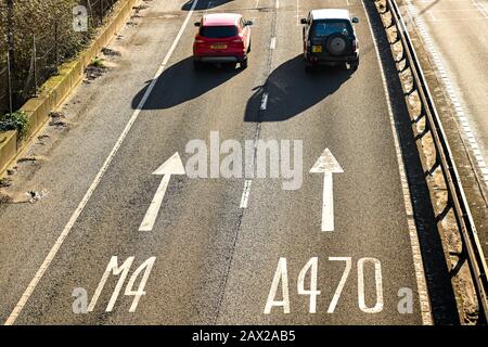 TAFFS WELL, NEAR CARDIFF, WALES - JUNE 2018: Aerial view of trafic and lane markings on the A470 trunk road at Taffs Well heading towards Cardiff. Stock Photo
