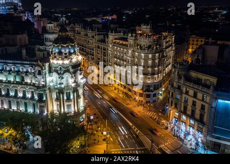 Madrid, Spain, night view of landmark buildings on Gran Via street. Stock Photo