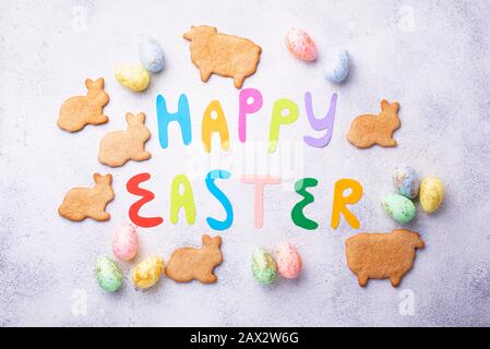 Happy Easter text and color eggs Stock Photo