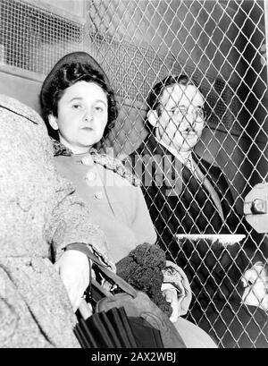 1951 , NEW YORK , USA : Julius and Ethel Rosenberg, separated by heavy wire screen as they leave U.S. Court House after being found guilty by jury . Photo by ROGER HIGGINS , World Telegram . Ethel Greenglass Rosenberg ( 1915 – 1953 ) and Julius Rosenberg ( 1918 – 1953 ) were Jewish American communists who were convicted and executed in 1953 for conspiracy to commit espionage during a time of war. The charges related to their passing information about the atomic bomb to the Soviet Union. This was the first execution of civilians for espionage in United States history. In 1995, the U.S. governme Stock Photo