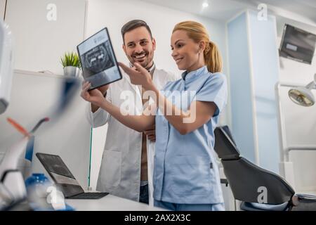 Image of two doctors looking at x-ray.Healthcare, medical and people concept. Stock Photo