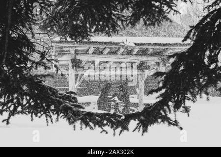 Jackson, Wyoming / USA - Jan 1, 2020: Snow falls on St. John’s Episcopal Church Stock Photo