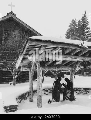 Jackson, Wyoming / USA - Jan 1, 2020: Snow falls on St. John’s Episcopal Church Stock Photo