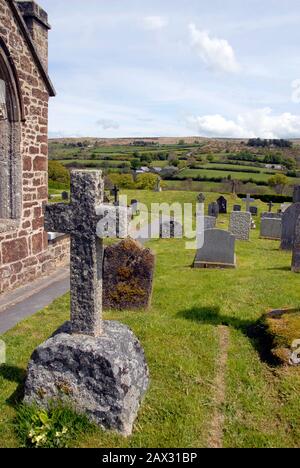 Churchyard, St Pancras church, Widecombe in the Moor, Devon, England, with views over the nearby countryside Stock Photo