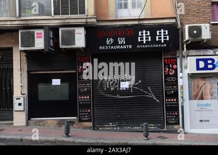 Madrid, Spain. 10th Feb, 2020. A Chinese shop is closed in Usera district.After the outbreak of Coronavirus in China, Chinese residents at Usera district in Madrid have closed hundreds of shops, hairdressers, restaurants and more for fear that they and clients will not get infected with the virus. The city of Madrid has 38,547 Chinese residents, according to official statistics. A quarter of the community has settled in this district. Credit: Jorge Sanz/SOPA Images/ZUMA Wire/Alamy Live News Stock Photo