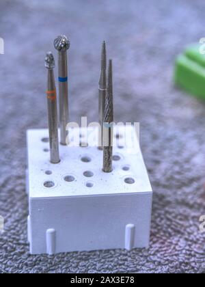 Drilling tools from diamond material used for stomatology. Treatment tools in dentist laboratory Stock Photo