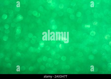 Abstract shiny circular green bokeh background. Spring Stock Photo