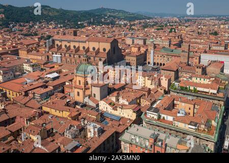 Aerial cityscape of Bologna, Italy with a view from the top of Asinelli tower to Piazza Maggiore, Basilica di San Petronio and Santa Maria della Vita Stock Photo