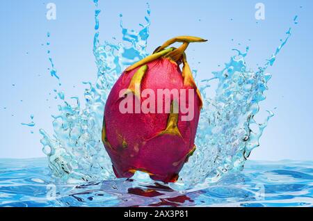 Pitaya or dragon fruit with water splashes, 3D rendering on blue background Stock Photo