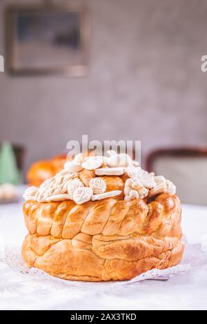 Traditional holiday eastern Orthodox church bread with decoration on table. Stock Photo