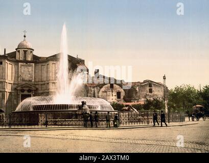 1895 ca. , ROMA,  ITALY :  Piazza DELL' ESEDRA ( today Piazza della Repubblica ) with the original fountain ( rebuilt later with the sculptor Rutelli NAIADI statues around 1910 ca, the lions was replaced to Piazza del Popolo Fountain of Obelisco ), in background the TERME and the church of CHIESA DI SANTA MARIA DEGLI ANGELI  . Photocrom print colors edited by Detroit Publishing Co. - CHIESA  -  ROME - LAZIO -  ITALIA - FOTO STORICHE - HISTORY - GEOGRAFIA - GEOGRAPHY  - ARCHITETTURA - ARCHITECTURE  -  fontana - BELLE EPOQUE - fountain ---- Archivio GBB Stock Photo