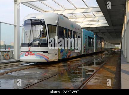 A tram travels on the Haizhu tram system in Guangzhou, China Stock Photo