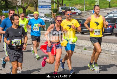 Participants of the annual 25th of April city marathon in Lisboa Stock Photo
