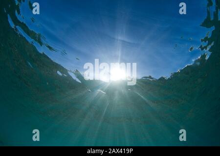 Sunbeams underwater Maui, Hawaii. Stock Photo