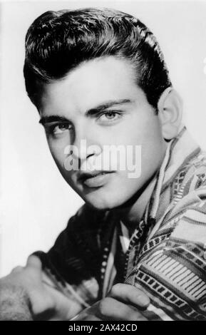 1957 ca :  The celebrated singer of Rock' n Roll  and movie actor FABIAN ( born Fabiano Forte , february 6, 1943 in Philadelphia's South Side ) . Fabian, was an American teen idol of the late 1950s and early 1960s. He rose to national prominence after performing several times on American Bandstand. Eleven of his songs reached the Billboard Hot 100 listing. Fabian was contracted to 20th Century Fox beginning with Don Siegel's Hound-Dog Man, based on Fred Gipson's novel. He appeared in more than 30 films . He was drafted but rejected for military service during the Vietnam War. According to USMC Stock Photo