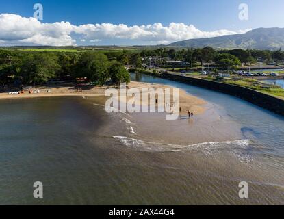 Aerial shot of the river anahulu leading to the twin arched road bridge in the North Shore town of Haleiwa Stock Photo