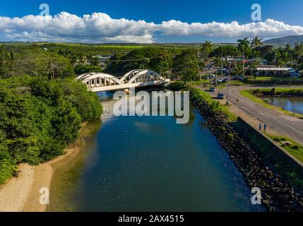 Aerial shot of the river anahulu and the twin arched road bridge in the North Shore town of Haleiwa Stock Photo