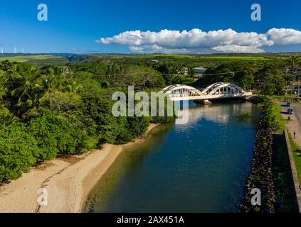 Aerial shot of the river anahulu and the twin arched road bridge in the North Shore town of Haleiwa Stock Photo