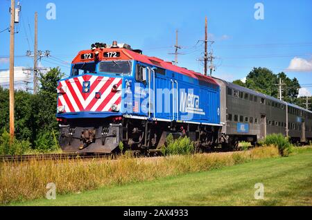 Geneva, Illinois, USA. A Metra locomotive leading an afternoon train bringing commuters home from Chicago.
