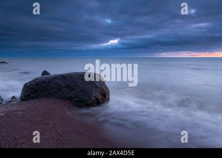 Sunset over Lake Superior, January, near Two Harbors, MN, USA, by Dominique Braud/Dembinsky Photo Assoc Stock Photo