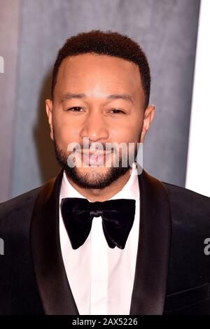 BEVERLY HILLS, CA - FEBRUARY 09: John Legend attends the 2020 Vanity Fair Oscar Party hosted by Radhika Jones at Wallis Annenberg Center for the Performing Arts on February 24, 2019 in Beverly Hills, California. Stock Photo