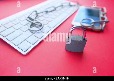 padlock and keyboard on table, cyber security concept  Stock Photo