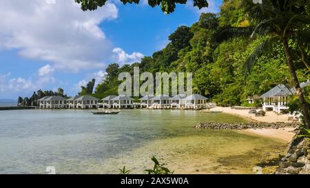 El Nido, Palawan, Philippines - Nov. 19, 2019: Beach cabanas at Lagen Island Resort. Stock Photo