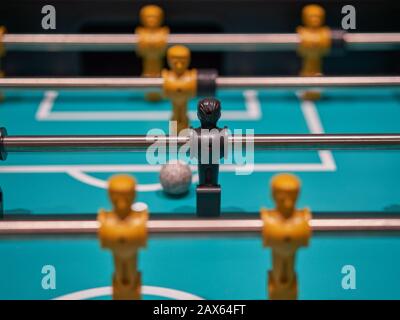 Table football scene. Focused on forward who has the chance to shoot a goal. Stock Photo
