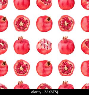 Seamless pattern of red pomegranates on white background isolated close up, whole and cut pomegranate with seeds repeating ornament, wallpaper Stock Photo