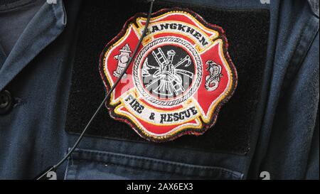 Bangkok, Thailand. 03rd Feb, 2020. A patch shows the coat of arms of the fire brigade, which is also engaged in animal rescue. In the Thai capital, the fire brigade is called more often for snakes than for extinguishing fires. (to dpa 'The Snake Hunter of Bangkok') Credit: Caroline Bock/dpa/Alamy Live News Stock Photo