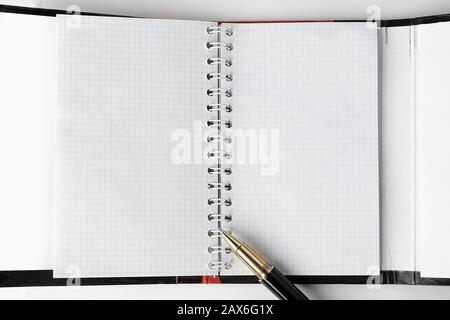 close up. open organizer and pen on white background .photo with copy space Stock Photo