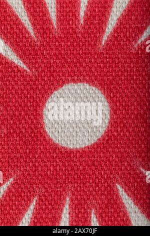 fabric with abstract pattern. fiber texture polyester close-up. fine grain felt red fabric background. Stock Photo