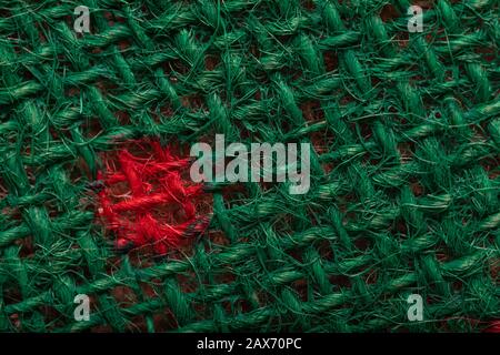 highly detailed photo fabric, close up green material texture background. Stock Photo