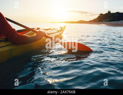 Close up of man holding kayak paddles Stock Photo